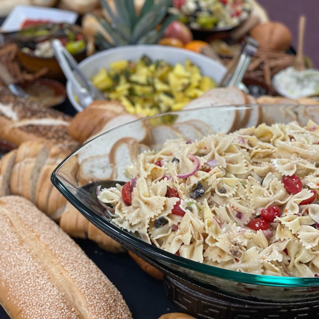 closeup of pasta salad dinner with bread