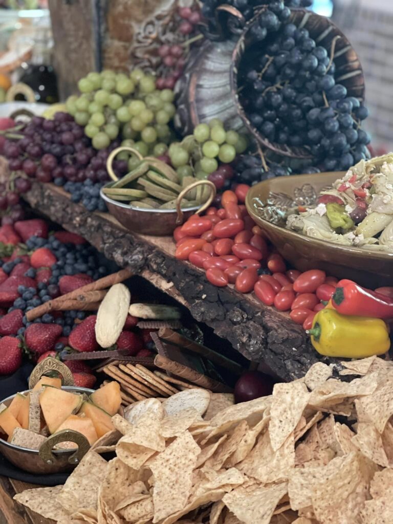 fruit, chips, vegetables, and more on wood display